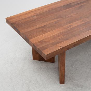 Dusty Deco, a contemporary walnut dining table.