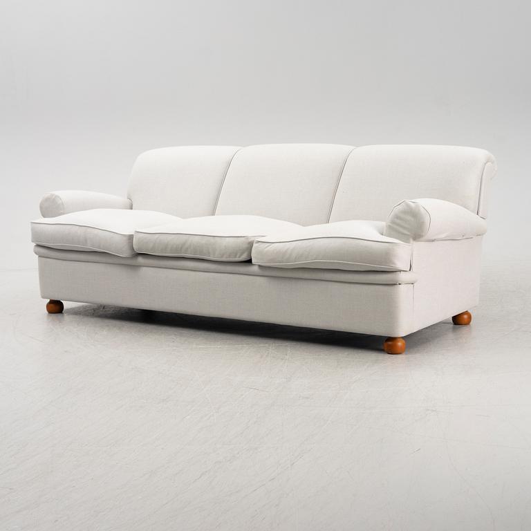 A model 703 sofa by Josef Frank for Firma Svenskt Tenn.