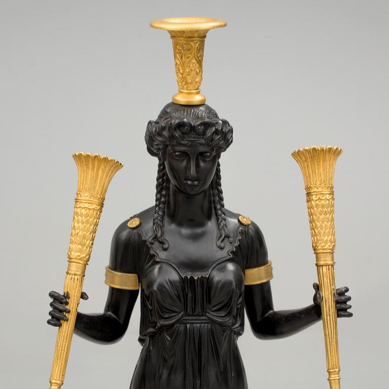 KANDELABRAR, ett par, för tre ljus, empirestil, 1900-tal.