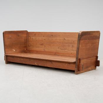 An Axel Einar Hjorth 'Lovö' stained pine sofa, Nordiska Kompaniet, Sweden 1930's.