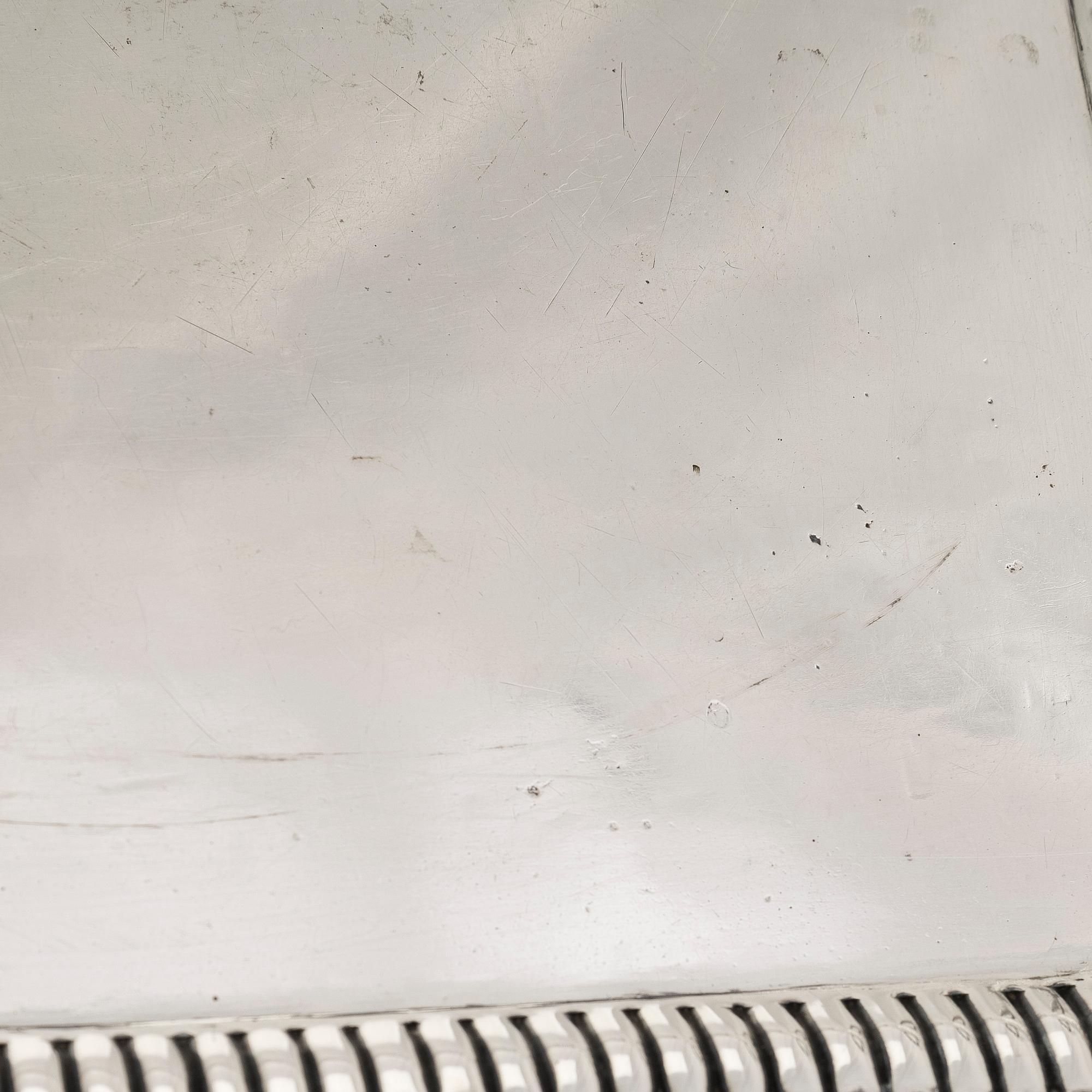 A silver tray, Saint Petersburg 1826. Unidentified maker's mark, Cyrillic M.F.