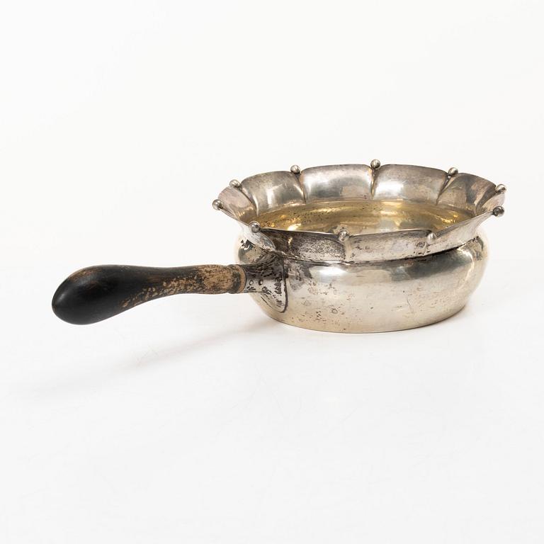 Sauceboat, silver, Oscar Sjögren, Gothenburg 1920, and spoon, silver, David Andersen, Norway early 20th century.