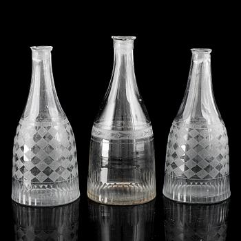 A set of three (2+1) bottles, 19th Century.