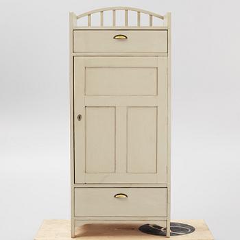 A cabinet, early 20th Century.