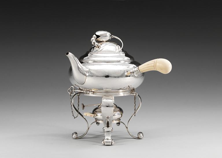 A Georg Jensen "Blossom" teapot on stand, Copenhagen 1918, 830/ 1000 silver, design nr 2.