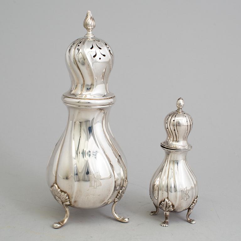 Two 20th century silver casters, one marked CG Hallberg, Stockholm 1938 and one with Swedish import marks.