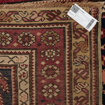 Matto, a runner, an antique Karabagh, ca 268,5-278 x 98,5-103,5 cm.
