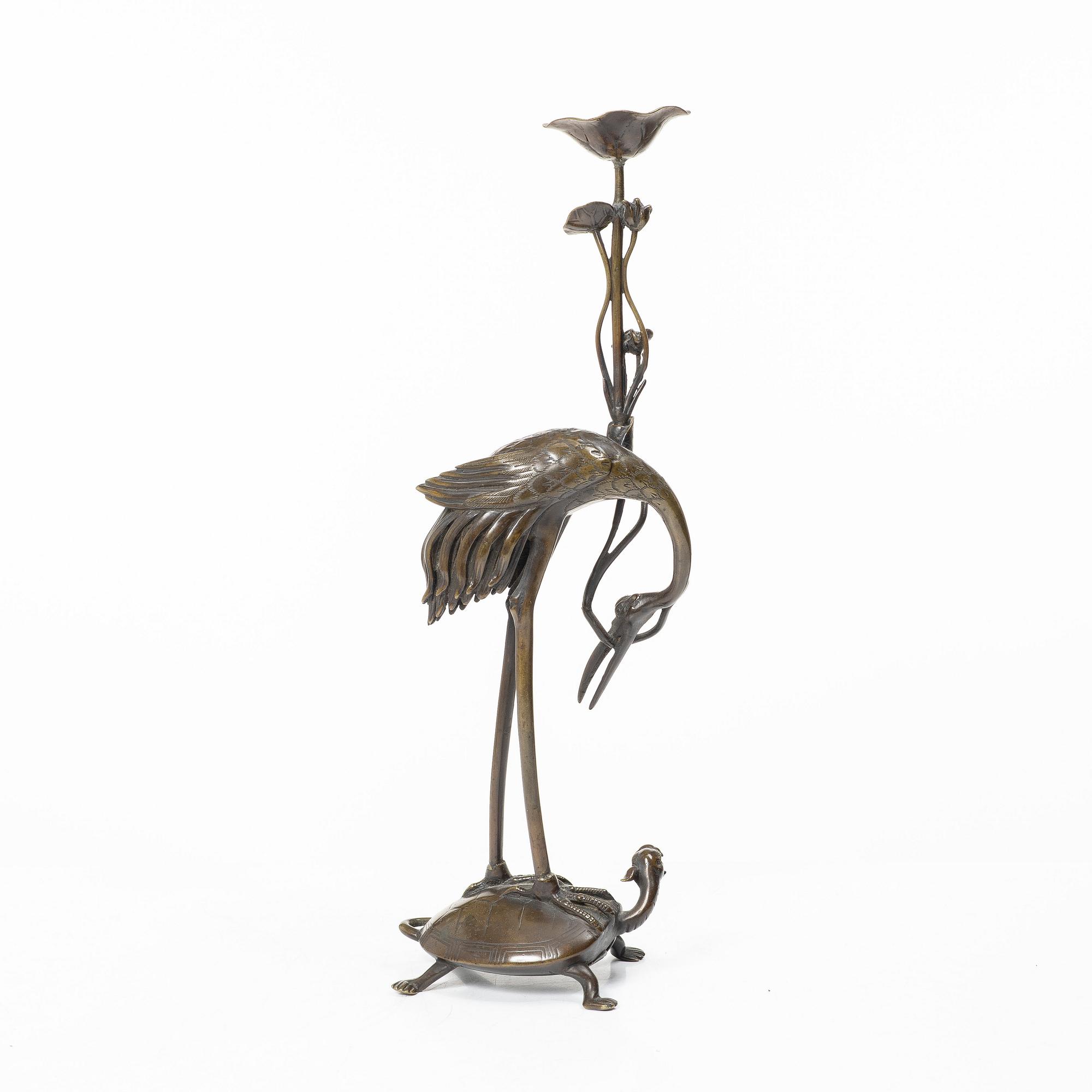A bronze candle holder, Japan, 20th century.