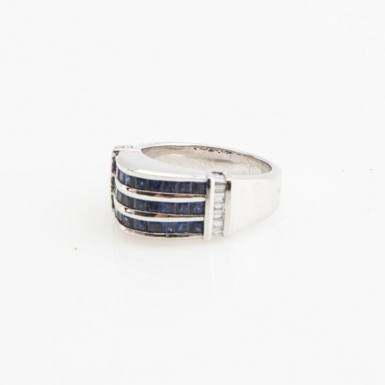 Ring, 18K white gold with baguette-cut diamonds and princess-cut sapphires.