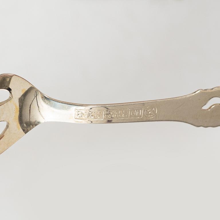 A Swedish silver Rococo style 4-piece coffee service, mark of Gewe, Malmö 1962-1978, and sugar tongs, Mylius, Norway.
