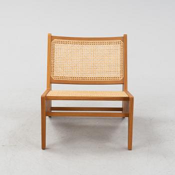 Pierre Jeanneret, a teak and rattan '058 Kangaroo' easy chair, Cassina, Italy.