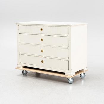 A painted chest of drawers, 19th Century.