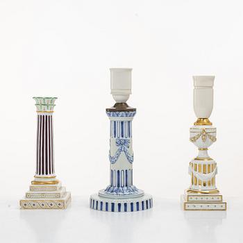 Royal Copenhagen, Two table lamps and a candlestick, Denmark, late 19th–early 20th century.