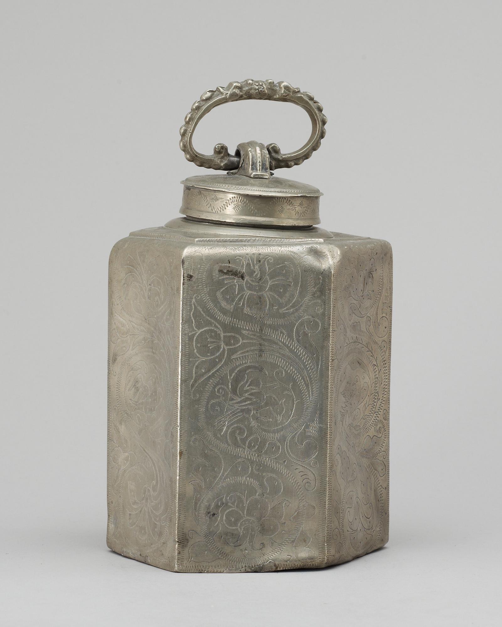 A pewter bottle. Unidentified marks.
