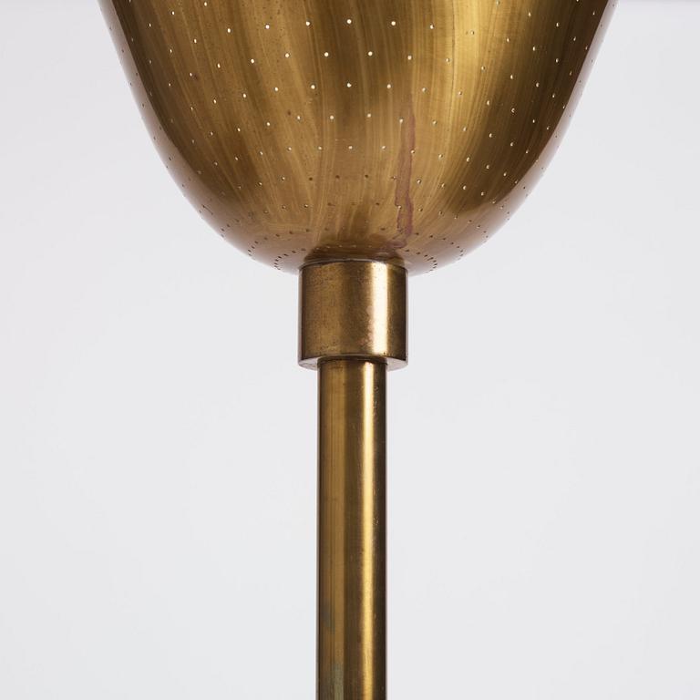 Carl-Axel Acking, a brass and leather floor lamp, designed for the Stockholm Association of Crafts in 1939.