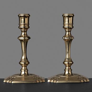 108. A pair of late baroque 18th century paktong candlesticks.