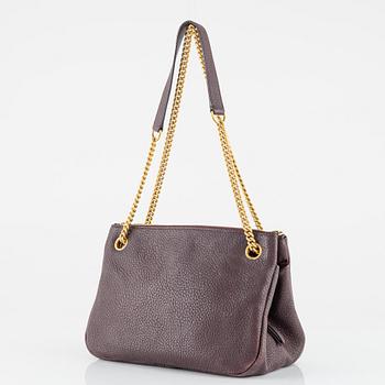Mulberry, a burgundy leather handbag.