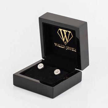 18K white gold, baguette and brilliant cut diamond earrings.