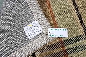 A "blanket" design rug, c. 236 x 149 cm.