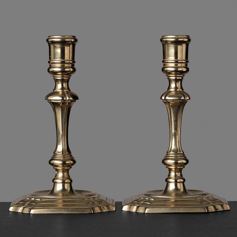 A pair of late baroque 18th century paktong candlesticks.