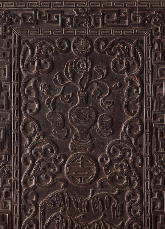 A set of three Chinese hardwood panels, Qing dynasty.