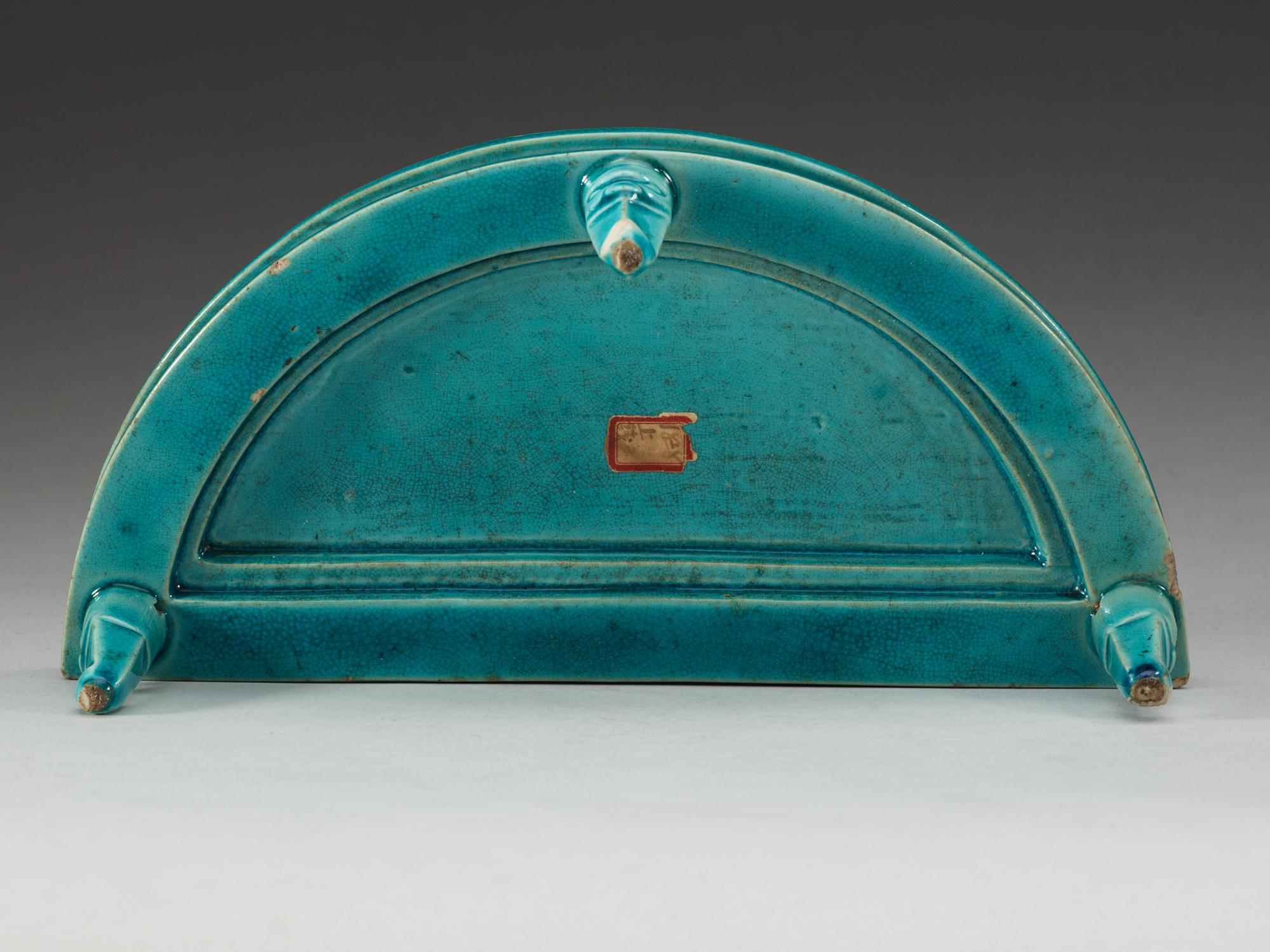 A turquoise glazed half moon shaped stand, Qing dynasty, Kangxi (1662-1722).