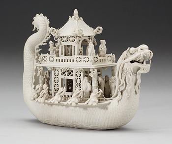 A white bisciut Dragon Boat, 19th Century.