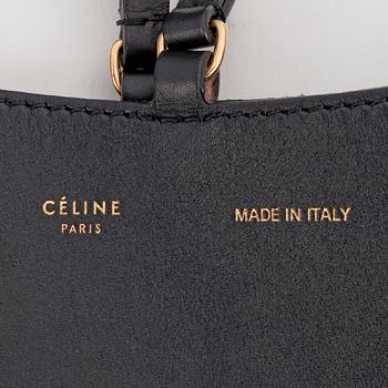 Céline, CÉLINE, a black leather shoulder bag.