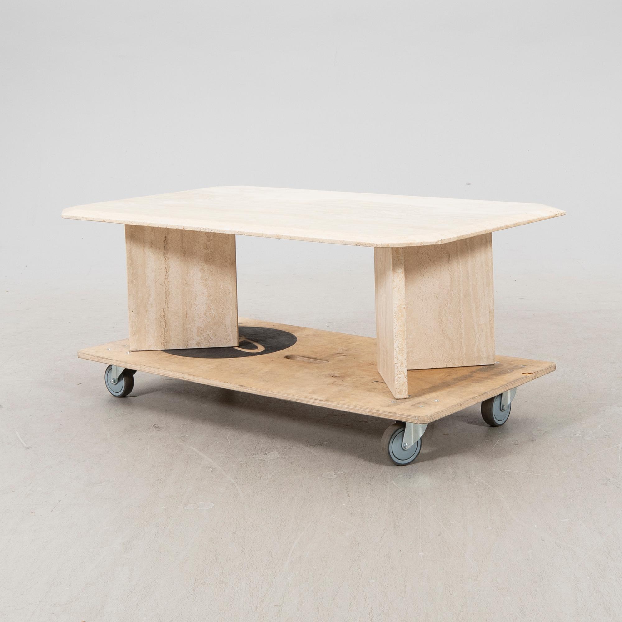 A late 20th century travertin  coffee table.