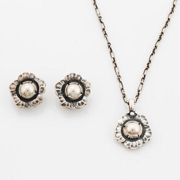 Georg Jensen Heritage silver a pair of earrings and a necklace.