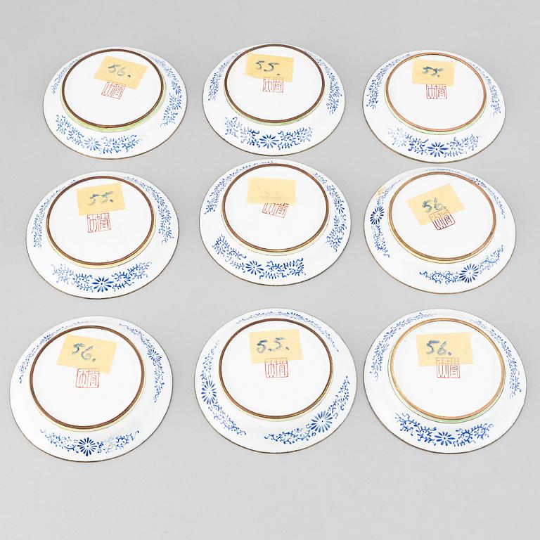 A set of 9 enamel on copper dishes, early 20th Century.