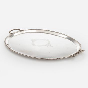 A Khlebnikov silver tray, with the Imperial court supplier's mark, Moscow 1888.