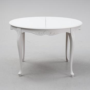 A painted Rococo style dining table, second half of teh 20th century.