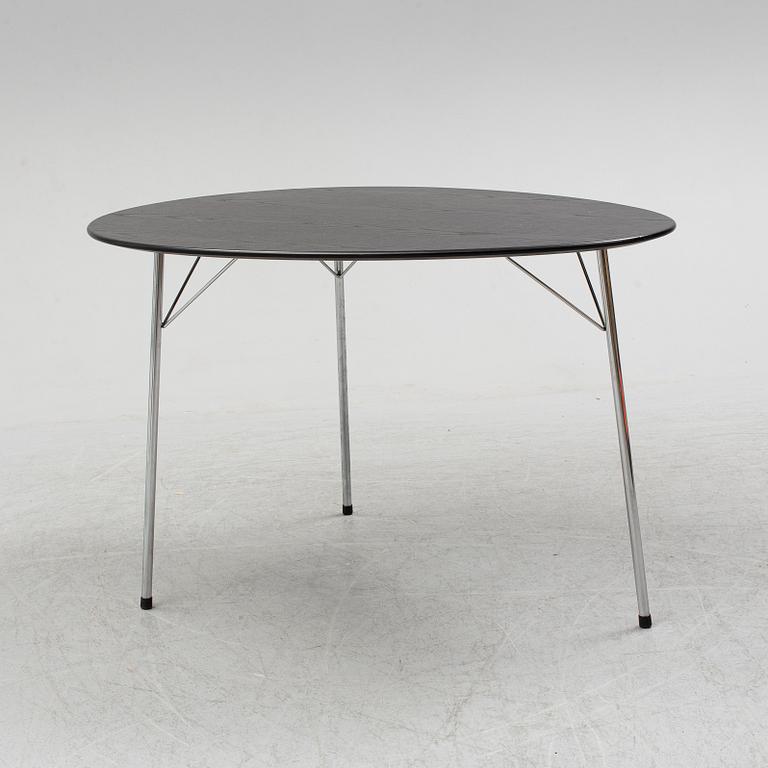 An Arne Jacobsen "Centenary Package" comprising three "Ant Chairs" and an eggshaped table, Fritz Hansen, Denmark.