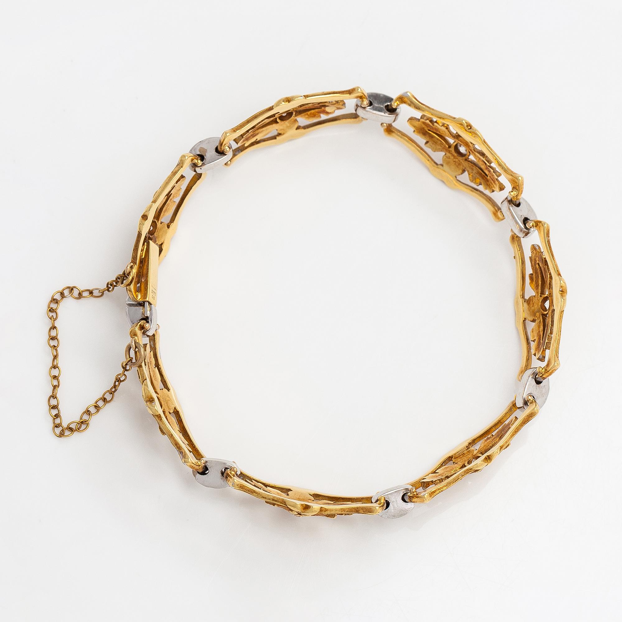 Armband, 18K guld och diamanter ca 0.56 ct totalt. Storbritannien.