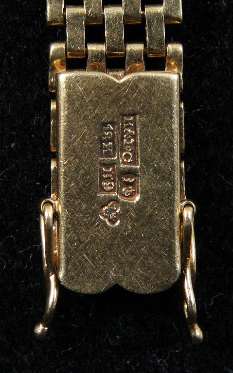 DAMARMBANDSUR, 18K guld. Urverk Jaeger Le Coultre. 26 gram.