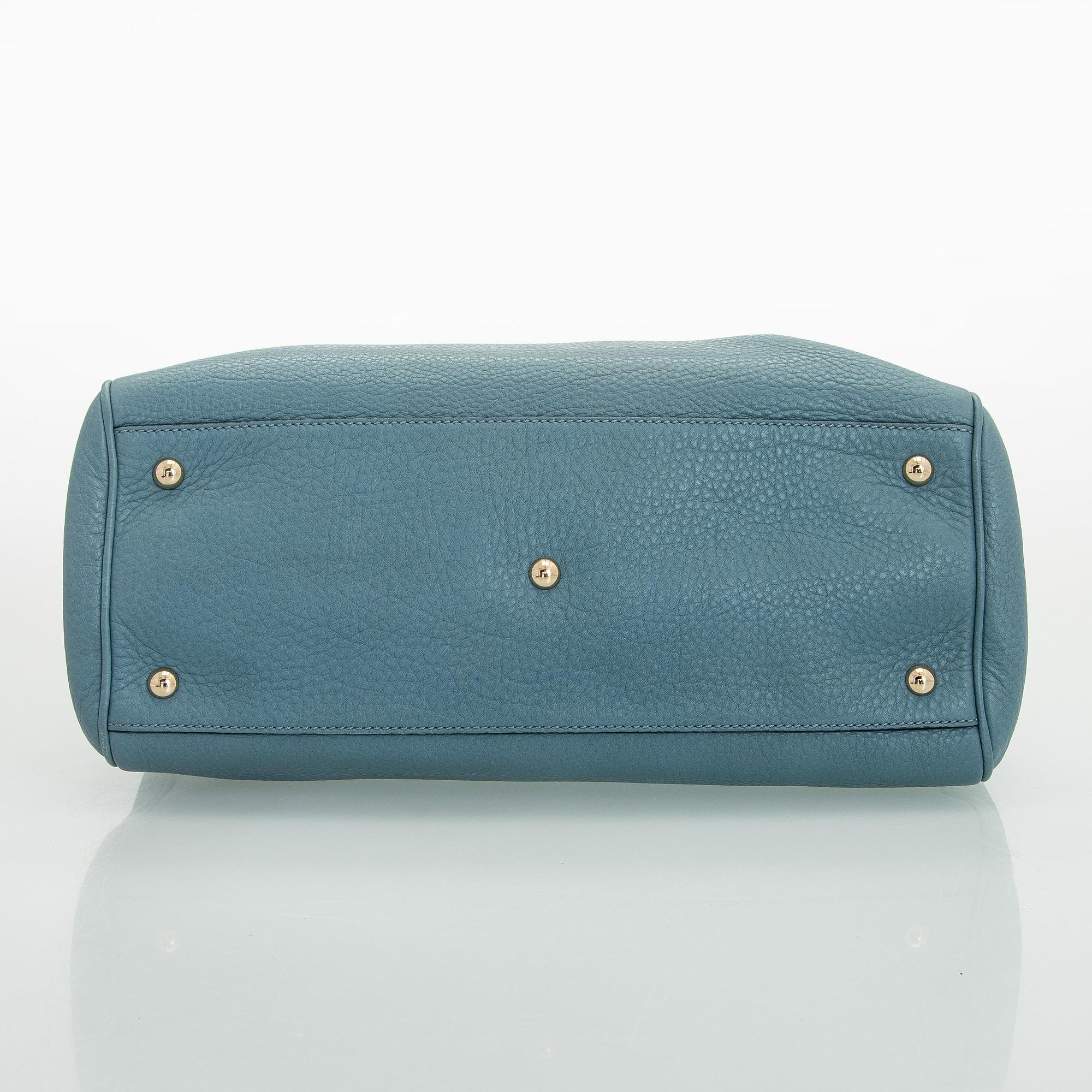 Gucci, a 'Bamboo shopper' bag.