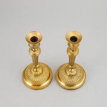A pair of Louis XVI-style candlesticks, ca 1900.