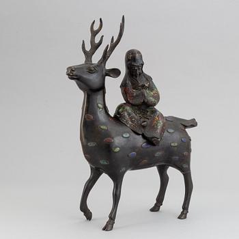 A bronze and enamel cencer in the shape of Shoulao on his deer, late qing dynasty 19th/20th century.