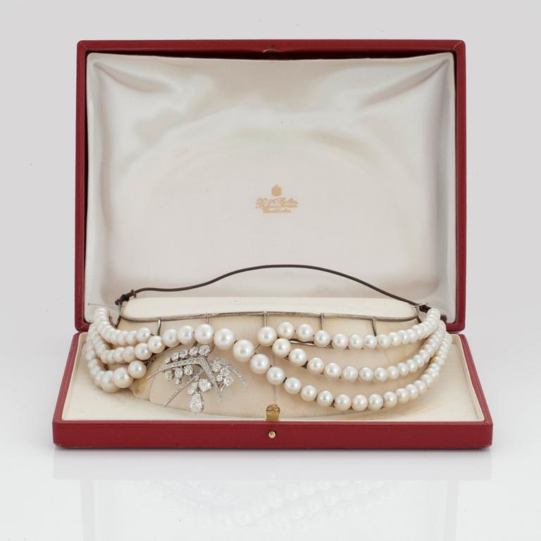 A TIARA with cultured pearls and a detachable brooch set with old-cut diamonds.