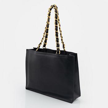 Chanel, a black leather and gold tone chain 'Shopper', 1991-1994.