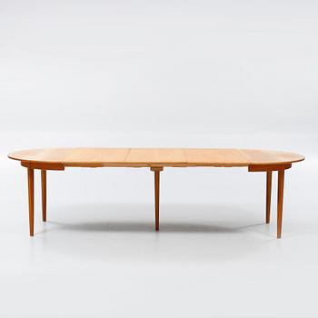 A dining table designed by Carl Malmsten and named "Calmare Nyckel".