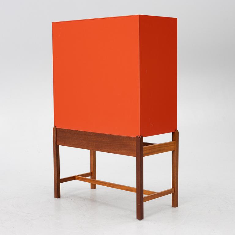Josef Frank, a red lacquered cabinet, model 2192, 'The Cardboard Cabinet' by Svenskt Tenn, after 1985.