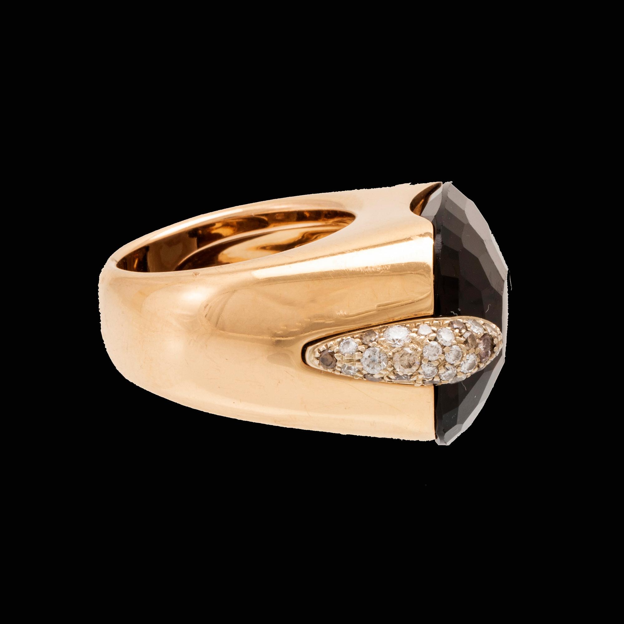 An 18K gold Pomellato "Pin Up" ring set with smoky quartz and round brilliant-cut diamonds.