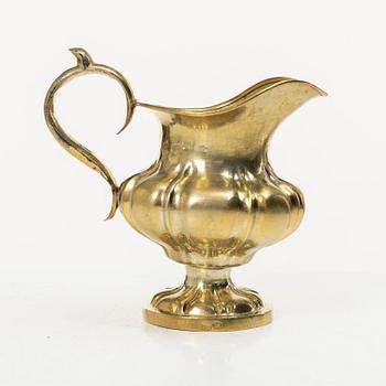 A Russian silver-gilt cream jug, Minsk, 1860s.