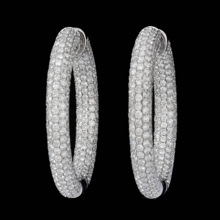 A pair of diamond, 8.52 cts in total, hoop earrings.