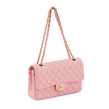 672. CHANEL, a pink caviar leather "double flap" shoulder bag.