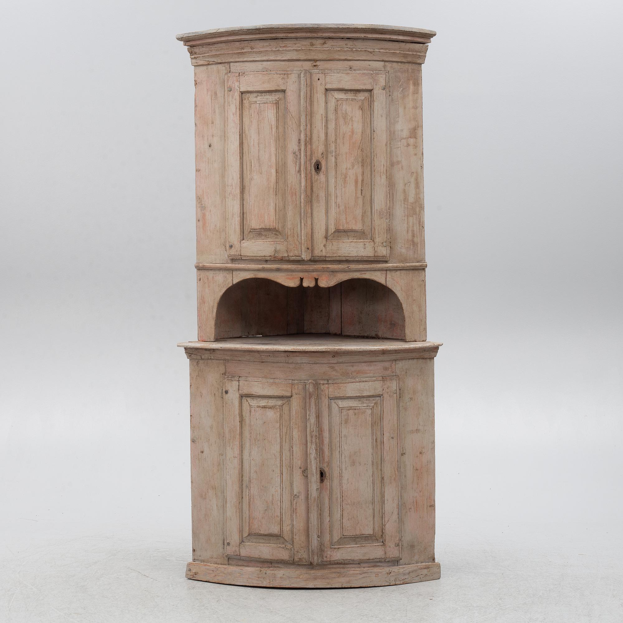 A Gustavian corner cabinet, circa 1800.