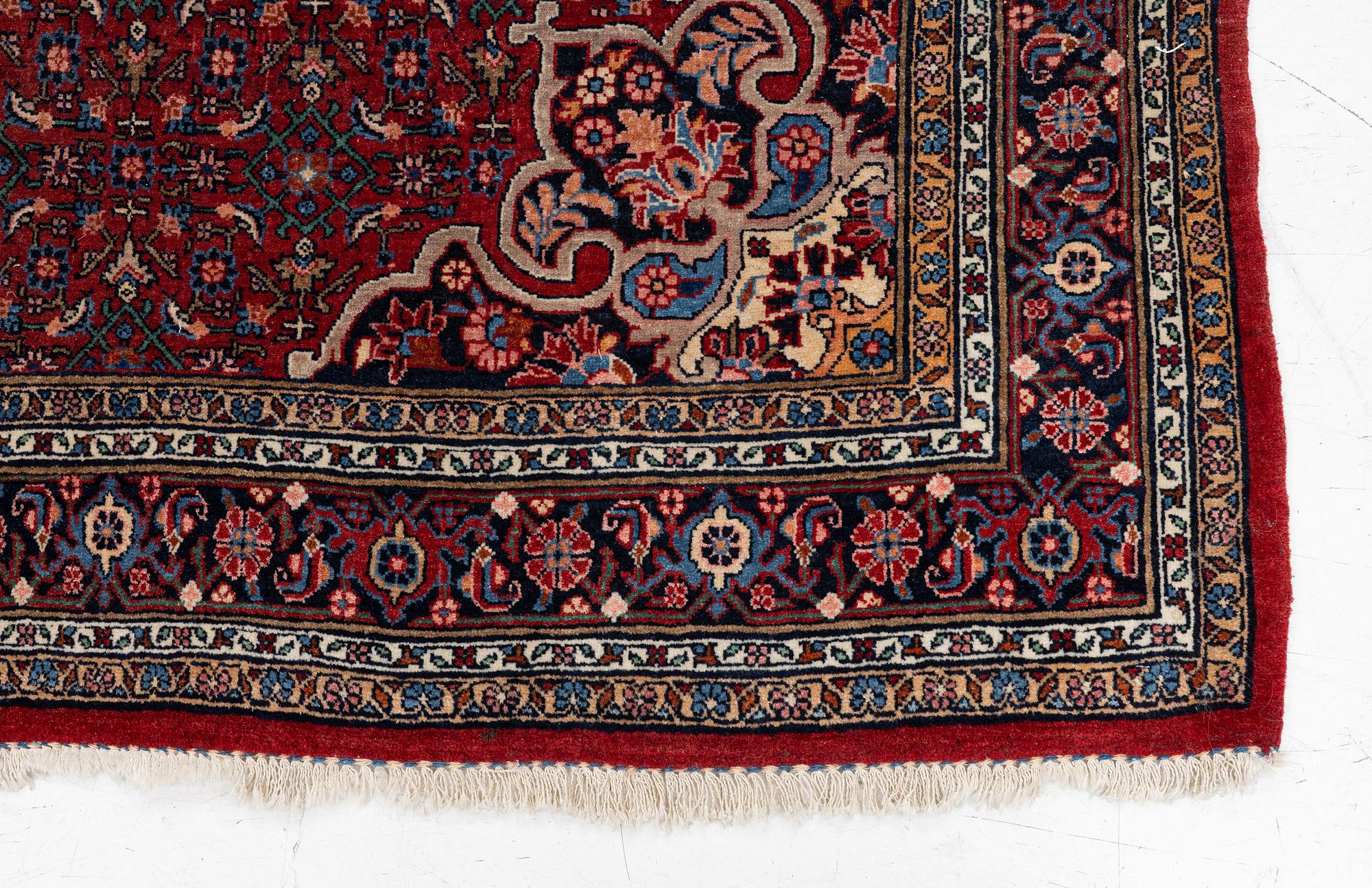 An old Bidjar rug, c. 225 x 143 cm.
