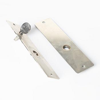Arne Jacobsen, a door handle 'AJ-Grebet' for SAS Royal Hotel, Copenhagen 1956, executed by Carl F Petersen.